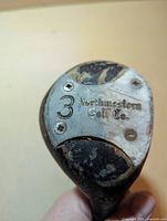 Close-up of sole plate showing Northwestern branding and 3-wood designation