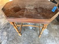 Full view of table showing octagonal top and legs