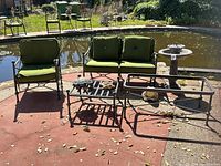 Overall view of furniture set by pond