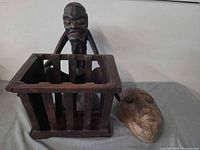 Mask and figure crate full view