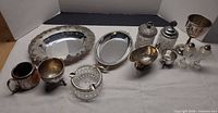 group shot of all silver-plated and glass items