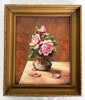 Front view of framed oil painting of roses