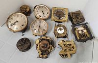 Group shot of all clock movements and faces