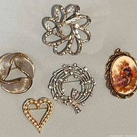Front view of all five jewellery pieces