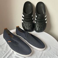 Top view of Adidas slides and H&M deck shoes