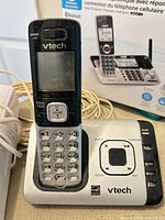 Base with handset seated, answering machine controls visible