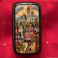 Top view showing painted cathedral scene over mother-of-pearl