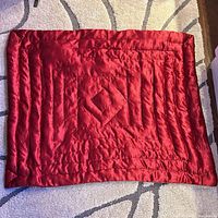 Full view of red side showing quilted pattern