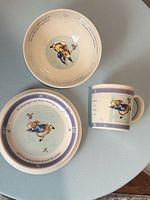 Overall view of plate, bowl, and mug showing matching design