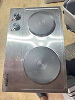 Top view showing two heating plates and control knobs