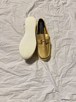 Gold loafers top and sole view