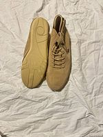 Sole view and side profile of both shoes