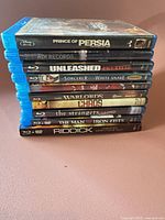 Stack of nine Blu-ray cases showing all spine titles