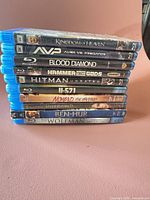Stack of ten Blu-ray cases showing title spines