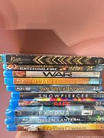 Stack of ten Blu-ray cases showing all titles on spines