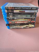 Stack of ten Blu-ray movie cases showing titles on spines