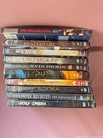 Spines of ten DVD cases listed