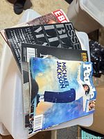 Stack of magazines showing People, Ebony and Essence covers