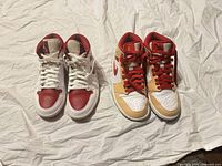 Both pairs side by side showing colorways and general condition