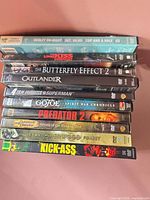 Stack of 10 DVD cases showing all spine titles