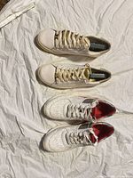 Both pairs of sneakers side-by-side