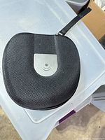 Closed black textured Plantronics hard case