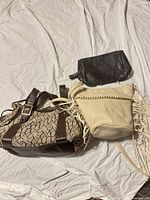 Group shot of all three handbags