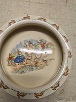 Top view showing Bunnykins bicycle scene and rim decoration