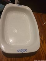 Top view of CorningWare dish interior with blue floral motif visible on rim