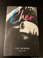 Front cover showing title, author image, dust jacket condition