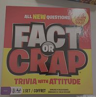 Front of Fact or Crap board game box displaying title, age recommendation 12+, player count 2+