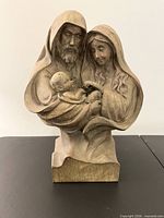 Front view of Holy Family statue showing full detail and pedestal base