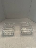 two assembled glass boxes front view