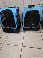 Front view of both blue Pet Gear carriers