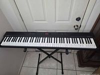 Full keyboard on X-stand front view