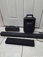 All four audio units grouped on floor