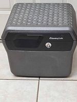 Front view of SentrySafe showing key lock and brand logo