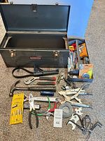 Overall lot with open Craftsman toolbox and hand tools spread out