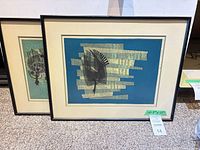 Both framed prints side by side showing design, mats, frames