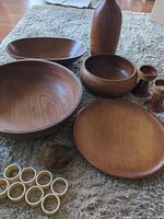 Group shot of all wooden pieces and napkin rings