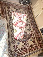 Full view of rug showing pattern and colors