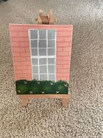 small brick-window painting on wood easel