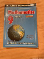 Front cover showing title, edition and globe graphic