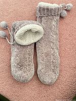 Slipper socks top view, showing cable knit and fleece lining
