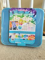 Front of blue case showing Just My Style Ultimate Supreme tie-dye branding