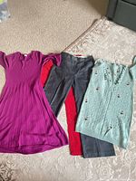 All four clothing items laid out