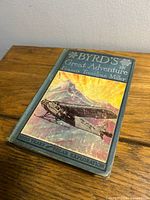 Front cover showing title, author, illustration, and cloth boards