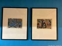 Both framed prints side by side showing framing and matting