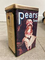 Front and side view of rectangular Pears’ Soap tin showing Victorian girl artwork and brand name