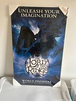 Front view shows artwork, title, slogan, shrinkwrap and corner protectors